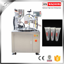 Machine de remplissage et de cachetage de tube cosmétique semi automatique de crème de main / crème hydratante